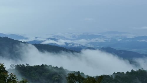 4K Beautiful mountains filled with fog.