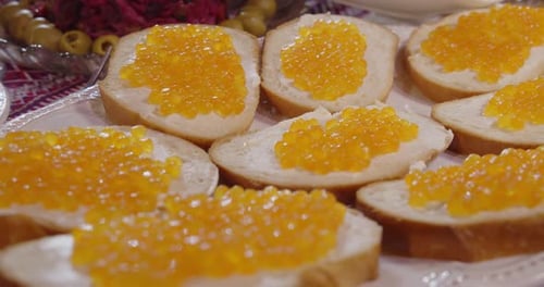 Caviar Sandwiches on White Plate, Close Up