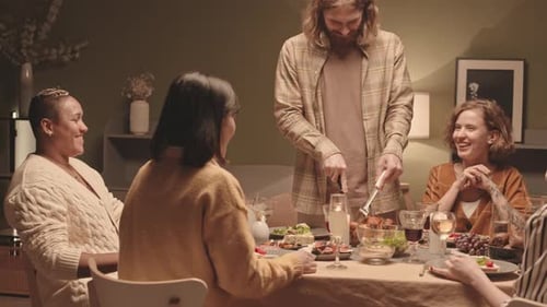 Friends Enjoy Festive Dinner Together at Home