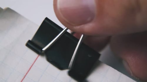 Black Binder Clip Removed From Graph Paper