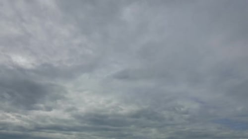 Time lapse of white cloud moving pass around sky background