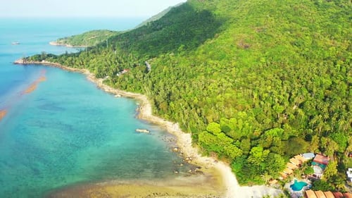 Aerial drone shot nature of perfect coastline beach journey by blue ocean and white sand background