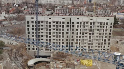 Top Shot of Modern Blue Cranes, Territory of the Construction Site on Which They Are Building New
