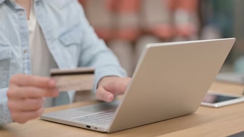 Male Hands Doing Online Payment on Laptop Close Up