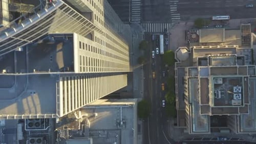 AERIAL: Slow Birds Eye View Flight Over Downtown Los Angeles California in Beautiful Sunrise Light
