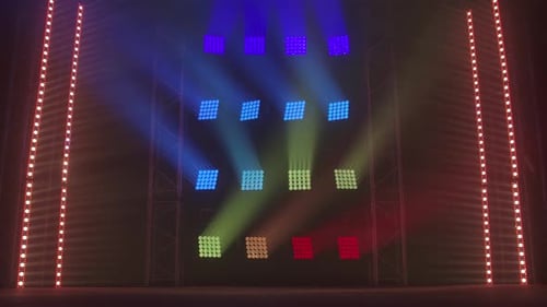 The Stage of a Small Theater with Red and Blue Spotlights. Lights Are Turned on From Darkness.
