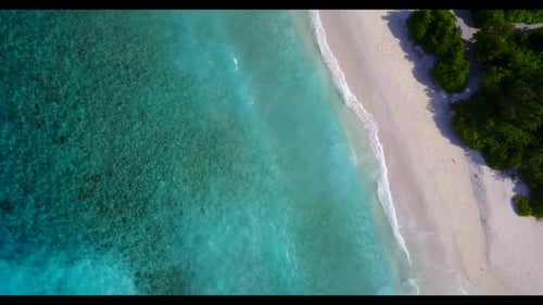 Aerial above nature of relaxing lagoon beach adventure by turquoise sea with white sand background o