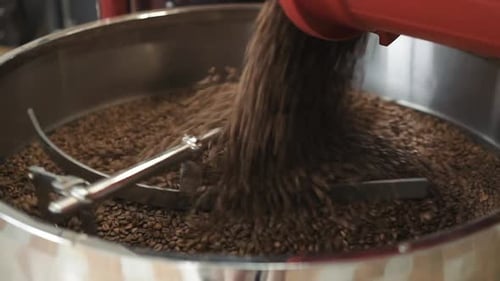 Coffee Beans Pouring into Silver Mixing Machine