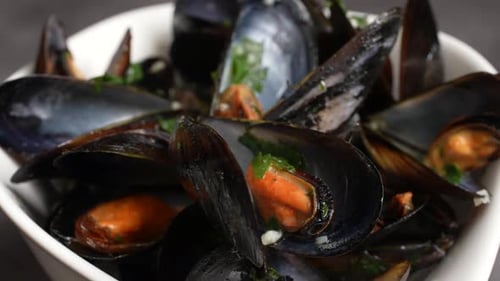 Delicious Fresh Mussels in White Bowl