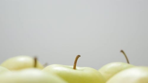 Healthy fresh apple fruit background with petioles slow tilt 4K 3840X2160 30fps UltraHD video - Til