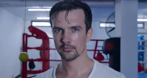 Portrait Sportsman Boxer of a Focused Caucasianeuropean Male Boxer Looking Straight Into Camera