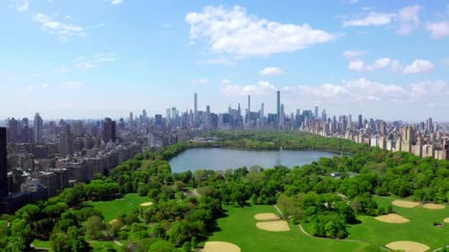 Aerial Video Above Green Central Park in the Middle of Manhattan New York