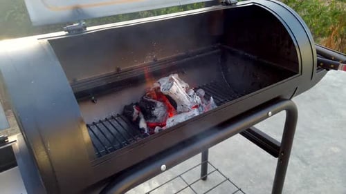 Getting the Charcol ready for the Summer BBQ. Meats will be cooking in No time.