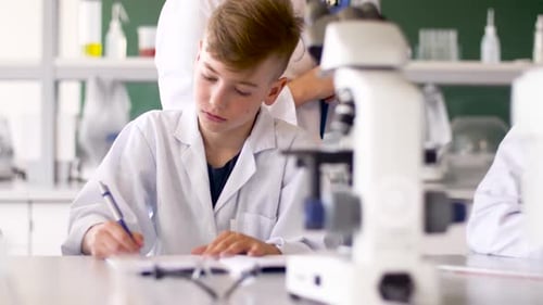 Teacher and Students Studying Chemistry at School 3