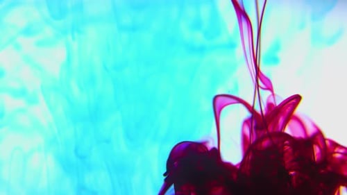Abstract Ink Swirls in Vivid Red, Purple, and Cyan