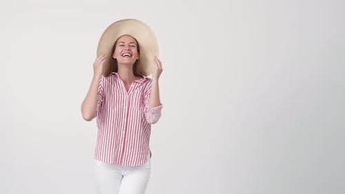 Woman Posing in Large Hat