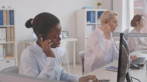 Diverse Helpline Receptionists Working Together