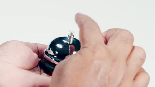 Chrome Service Bell Ringing in Hand