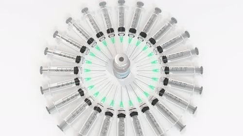 Medical Vaccine Vial Reveal with Rotating Syringes