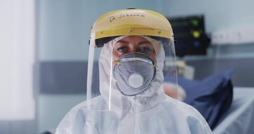 Healthcare Worker Wearing Full Personal Protective Equipment