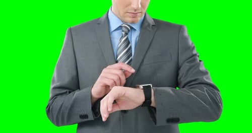 Businessman using smart watch