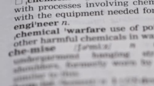 Close Up of Pencil Touching Chemical Warfare Definition