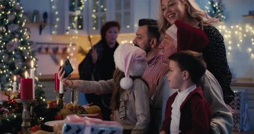 Happy Family Taking Holiday Pictures Together