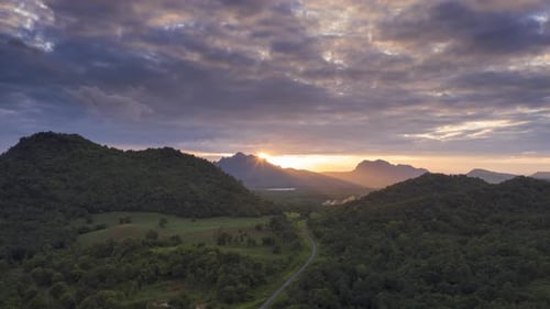 Aerial view of drone evening view dramatic sky, sunset behind the mountains,