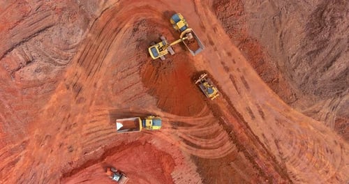 Construction Equipment Working in Dirt Landscape Aerial