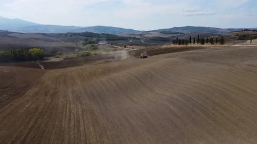 Tractor machinery plow ground rural agriculture field aerial view