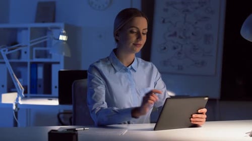 Businesswoman Having Video Call at Night Office 97