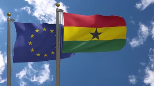 European Union and Ghana Flags Waving Together in Blue Sky