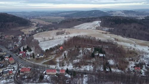 Aerial View of Village Near Mountains