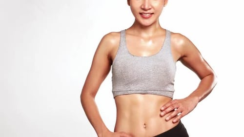 Sweaty Young Adult Woman Posing After Workout