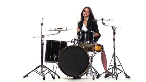 Stylish Young Woman Drummer Playing Drums