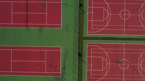 View From the Height of the Empty Tennis Courts in the Daytime in Summer