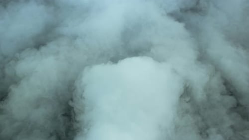 Abstract Swirling White and Gray Fog Background