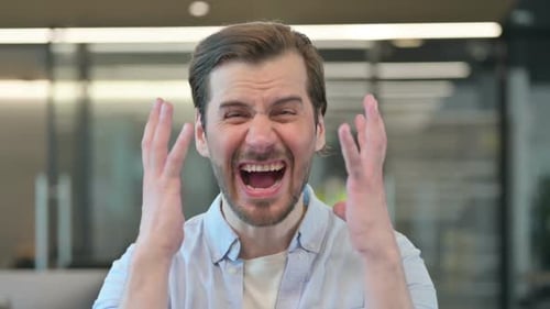 Man Laughing, Smiling, and Expressing Range of Emotions