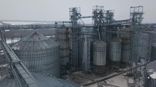 Aerial View of Grain Elevator in Winter Landscape