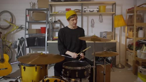 Rock Musician Practicing Playing Drums
