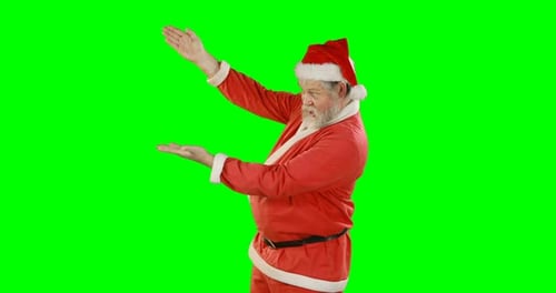 Papá Noel haciendo un gesto en la pantalla verde