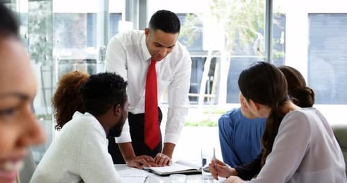 Business Team Collaboration at Meeting in Modern Office