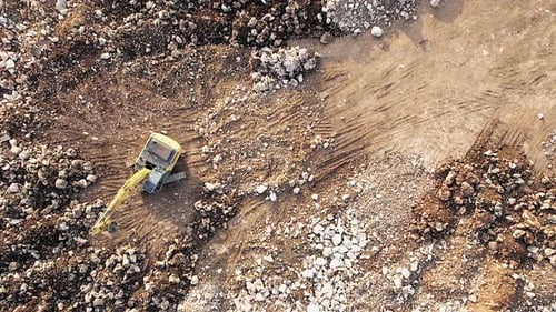 Aerial View of Working Excavator