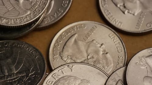 Rotierende Stock-Bildmaterial von amerikanischen Vierteln (Münze - 0,25$) - GELD 0231