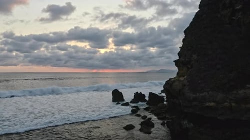 Heavenly Skies, Beautiful Waves on Vast Ocean Horizon and Cliff in Indonesia