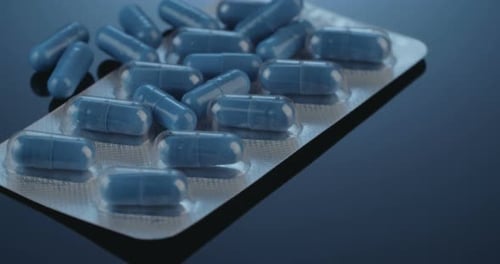 Blue Medicine Capsules and Blister Pack