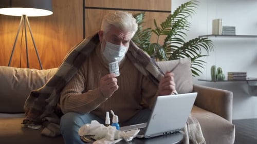 Senior Man Telehealth Appointment at Home