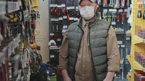 Portrait of Man in Face Mask at Hardware Store