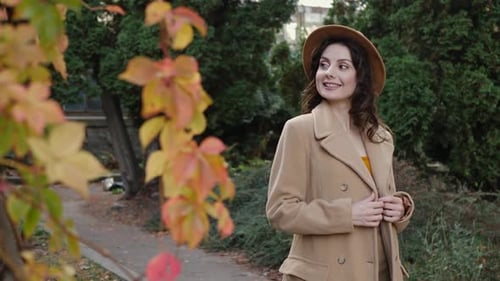 Woman in Autumn Park