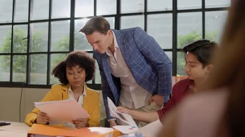 Young Adults Collaborating in an Urban Office